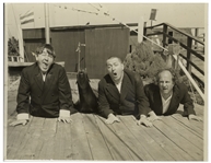 Moe Howard Personally Owned 10 x 7.5 Glossy Publicity Photo From 1939 in Atlantic City, With Curly, Moe & Larry Mimicking a Seal -- Photo Printed to Board, Very Good Condition